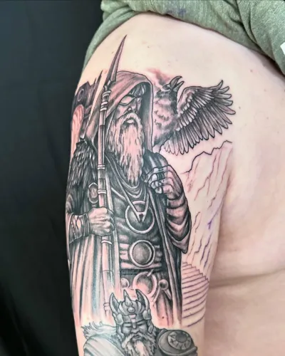 Black and grey military memorial half sleeve with an eagle in flight — by Adam Crane at Ministry Ink