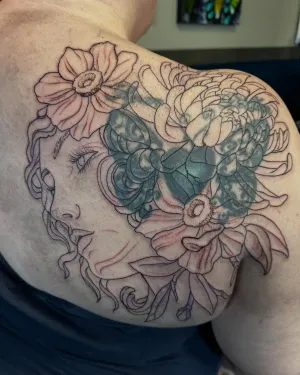 Fine line black and grey floral shoulder piece, freshly outlined — by Adam Crane
